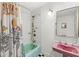 Charming bathroom featuring fun and quirky decor including a vintage inspired color palette at 6464 Whitley Ln, Indianapolis, IN 46260