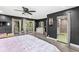 The spacious bedroom flows into an open closet and en suite bathroom for a private retreat at 6464 Whitley Ln, Indianapolis, IN 46260