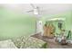 Bright bedroom with a stylish rocking chair and ample closet space offering convenience and charm at 6464 Whitley Ln, Indianapolis, IN 46260