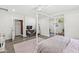 Bedroom with four-poster bed, a dresser and television at 6464 Whitley Ln, Indianapolis, IN 46260