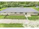 Charming home featuring a well-manicured front lawn and black fence at 6464 Whitley Ln, Indianapolis, IN 46260