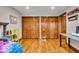 Cozy bedroom with hardwood floors and large closets at 6465 Lawrence Dr, Indianapolis, IN 46226