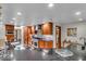 Stylish kitchen featuring granite counters, modern appliances, mosaic tile, and ample storage space at 6465 Lawrence Dr, Indianapolis, IN 46226