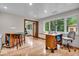 Office room featuring hardwood floors, natural light, and modern furnishings at 6465 Lawrence Dr, Indianapolis, IN 46226
