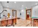 Spacious office featuring hardwood floors, built-in cabinets and desk space at 6465 Lawrence Dr, Indianapolis, IN 46226
