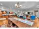 Spacious open-concept design with a seamless transition from the kitchen to the living and dining areas at 6465 Lawrence Dr, Indianapolis, IN 46226