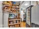 Walk-in pantry with shelving and a beverage refrigerator, offering ample storage for all your groceries and drinks at 6465 Lawrence Dr, Indianapolis, IN 46226
