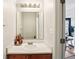 Bathroom features include a vanity sink with cabinets and an unframed mirror at 7045 Gavin Dr, Indianapolis, IN 46217