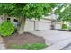 Inviting townhouse with well-maintained landscaping, one car garage and cozy front porch at 7045 Gavin Dr, Indianapolis, IN 46217