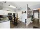 Modern kitchen features sleek appliances, white cabinetry, and a stylish dining area at 7045 Gavin Dr, Indianapolis, IN 46217