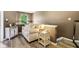 Cozy loft area with couch, decor, and bright natural light at 7045 Gavin Dr, Indianapolis, IN 46217