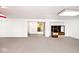 Finished basement offers an open floorplan with neutral carpet flooring at 7245 Highburry Dr, Indianapolis, IN 46256