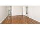 Bedroom with hardwood floors and multiple doorways at 7245 Highburry Dr, Indianapolis, IN 46256