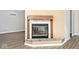 Close-up of a fireplace features a hearth with light stone at 7245 Highburry Dr, Indianapolis, IN 46256