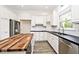 Modern kitchen with granite countertops, stainless steel appliances, and ample cabinet space at 7245 Highburry Dr, Indianapolis, IN 46256