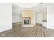 Inviting living room with fireplace and hardwood floors at 7245 Highburry Dr, Indianapolis, IN 46256