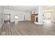 Spacious living room features hardwood floors, fireplace, and ample natural light at 7245 Highburry Dr, Indianapolis, IN 46256