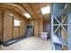 Bright shed interior with skylights, shelving, and ample room for storage, perfect for organization at 7245 Highburry Dr, Indianapolis, IN 46256