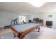 Spacious basement featuring a pool table, TV, and recreational area at 7420 Denton Cir, Indianapolis, IN 46256