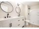 Bathroom with double sinks and walk-in shower at 7665 Stones River Ct, Indianapolis, IN 46259