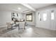 Entryway with an office area with chairs, a desk, hardwood floors, and natural light at 7665 Stones River Ct, Indianapolis, IN 46259