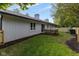 Large backyard showcasing the patio, furniture, and perimeter fence at 780 Wilson Terrace Ct, Carmel, IN 46032