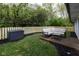 Backyard with a seating area, wood fence, and tasteful landscaping at 780 Wilson Terrace Ct, Carmel, IN 46032