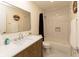 Bathroom features a single sink vanity, a large mirror, and a shower/tub combo at 780 Wilson Terrace Ct, Carmel, IN 46032