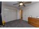 This bedroom features a ceiling fan and a closet for storage with an ensuite bathroom at 780 Wilson Terrace Ct, Carmel, IN 46032