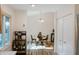 Bright dining area with round table and hardwood floors leads from kitchen to the main part of the home at 780 Wilson Terrace Ct, Carmel, IN 46032