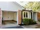 Charming home exterior with a brick accent, an open garage and manicured bushes at 780 Wilson Terrace Ct, Carmel, IN 46032