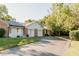Charming home with attached garage, brick accents, well-manicured lawn, and an extended driveway at 780 Wilson Terrace Ct, Carmel, IN 46032