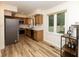 Modern kitchen features stainless steel appliances, white countertops, and natural wood cabinets at 780 Wilson Terrace Ct, Carmel, IN 46032