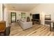 Bright living room featuring new floors, neutral paint, and a modern aesthetic perfect for relaxation at 780 Wilson Terrace Ct, Carmel, IN 46032