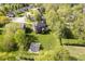 Beautiful two-story home with an expansive lawn surrounded by mature trees at 839 Pebble Brook Pl, Noblesville, IN 46062