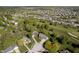 Aerial view showcasing home nestled in mature trees, surrounded by a residential neighborhood at 839 Pebble Brook Pl, Noblesville, IN 46062