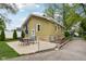 A nice backyard offers a concrete patio and a table with chairs, perfect for relaxation at 944 N Harbison Ave, Indianapolis, IN 46219