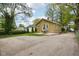 A nice backyard offers a concrete patio and a table with chairs, perfect for relaxation at 944 N Harbison Ave, Indianapolis, IN 46219