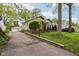 Charming bungalow with well-maintained landscaping, long driveway and detached garage at 944 N Harbison Ave, Indianapolis, IN 46219