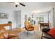 Comfortable living room featuring hardwood floors, opens to the kitchen with seamless entertaining space at 944 N Harbison Ave, Indianapolis, IN 46219