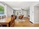 Open-concept living room showcases hardwood floors, area rug, and comfortable seating arrangement at 944 N Harbison Ave, Indianapolis, IN 46219
