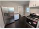 Modern kitchen featuring stainless steel appliances, sleek countertops, and ample cabinet space at 1009 Chestnut St, Anderson, IN 46012