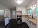 Modern kitchen equipped with stainless steel appliances, sleek countertops, and ample cabinet space at 1009 Chestnut St, Anderson, IN 46012
