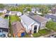 Aerial view of a neighborhood, highlighting the property's location among mature trees and well-maintained homes at 1009 Harrison St, Indianapolis, IN 46202