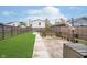 Backyard has a large patio with custom wooden benches, and a well-maintained lawn, ideal for outdoor living at 1009 Harrison St, Indianapolis, IN 46202