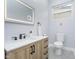 Well-lit bathroom with modern fixtures, lighted mirror and stylish vanity at 1009 Harrison St, Indianapolis, IN 46202