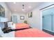 Serene bedroom featuring two beds, bright light, sleek vinyl flooring and minimalist decor at 1009 Harrison St, Indianapolis, IN 46202