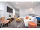 Bright living room with stylish seating, an entertainment center, and a cozy atmosphere at 1009 Harrison St, Indianapolis, IN 46202