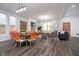 Open-concept space with dining and living areas featuring modern decor and ample natural light at 1009 Harrison St, Indianapolis, IN 46202