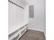 Well-organized mudroom with hooks, bench, and storage cabinets to keep belongings tidy at 1009 Harrison St, Indianapolis, IN 46202